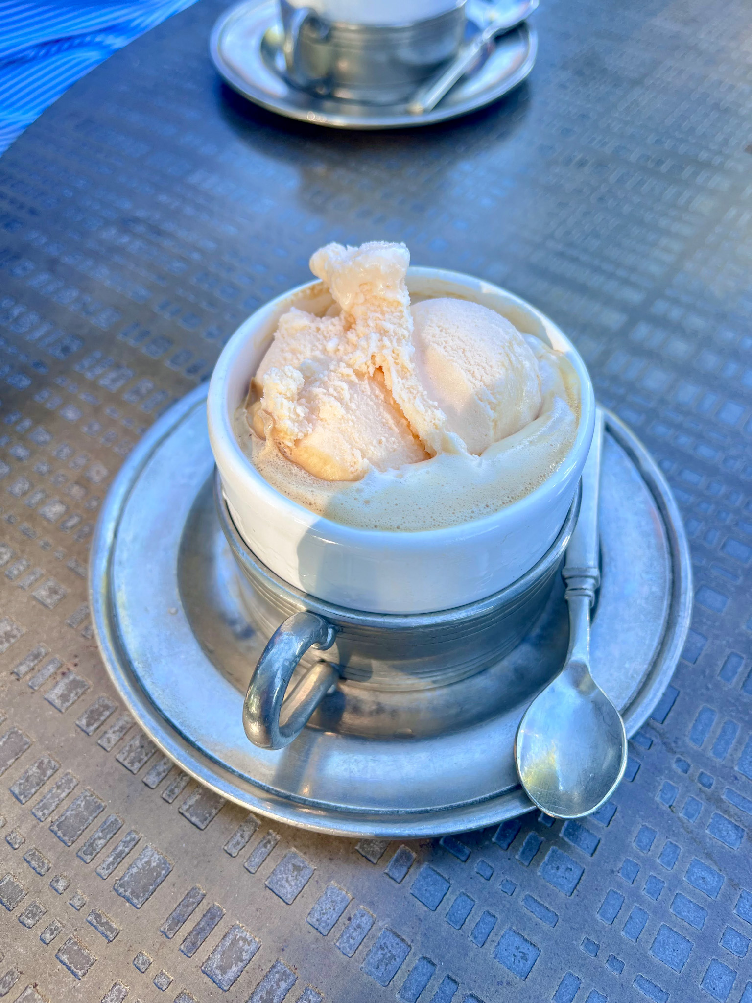 Vanilla ice cream and coffee in a cup on the patio at White Rose Estate