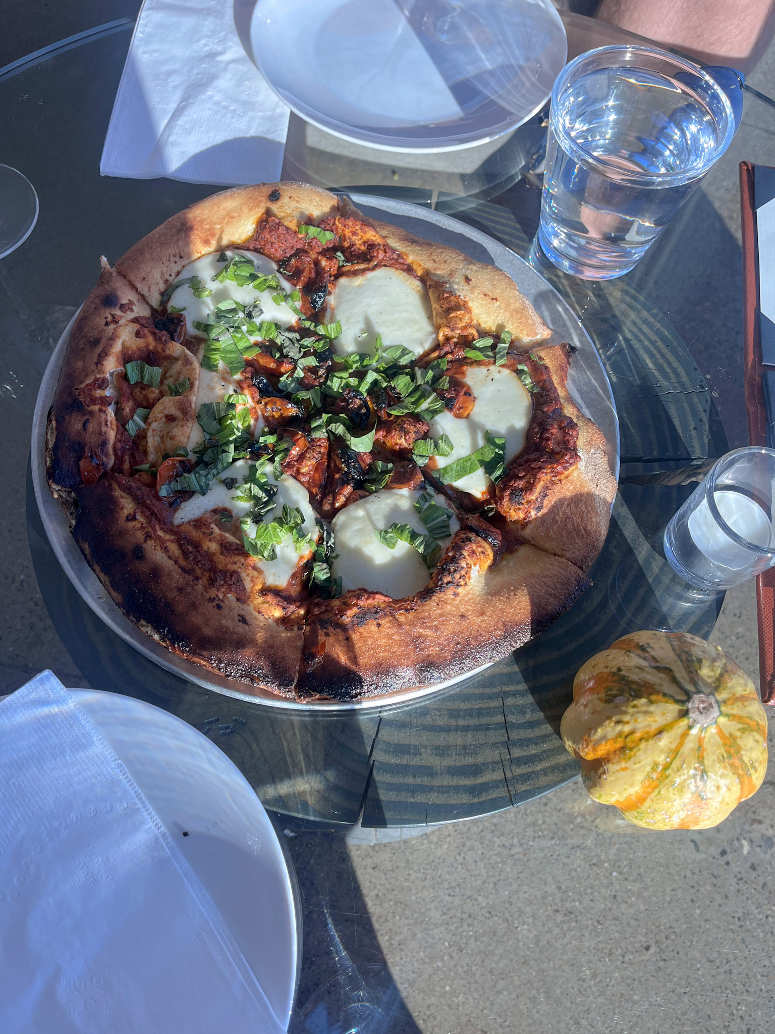 Wood-fired Margherita pizza with mozzarella and basil on our table at Furioso Vineyards